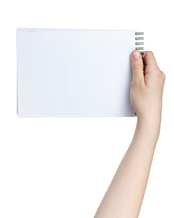 female teen hand holding notebook on a spring to write something, isolatedの写真素材