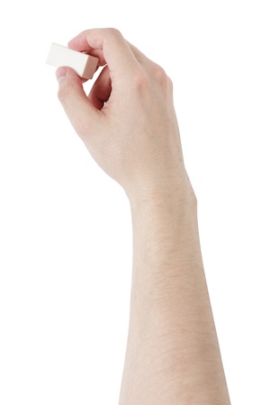adult man hand erasing something with eraser, isolated on whiteの写真素材