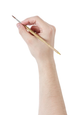 adult man hand draw something with paintbrush, isolated on whiteの写真素材