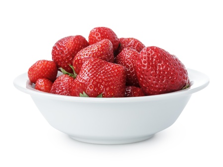 ripe strawberries in bowl, isolated on white backgroundの写真素材