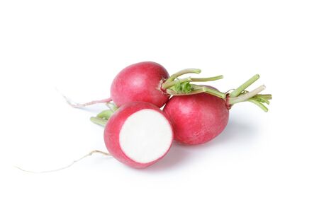 heap of ripe radishes, isolated on white backgroundの写真素材
