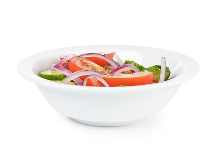 mix salad from tomatoes cucumbers and onion, isolated on whiteの写真素材