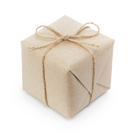 small cube box with string bow, isolated on whiteの写真素材