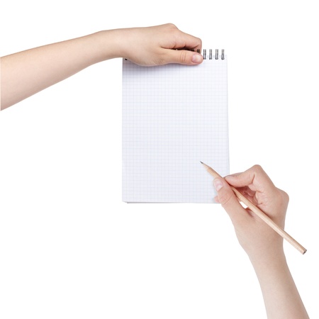 female teen hands writing something in notepad, isolatedの写真素材