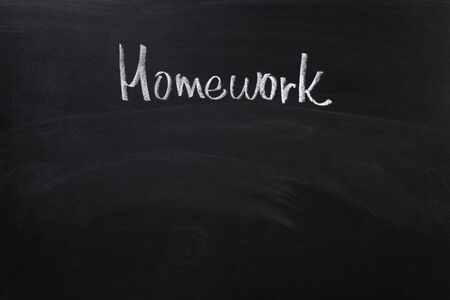 homework word on blackboard, school themeの写真素材