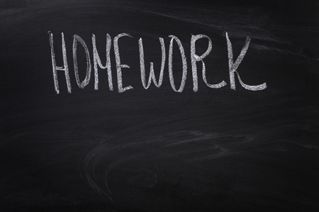 homework word on blackboard, school themeの写真素材