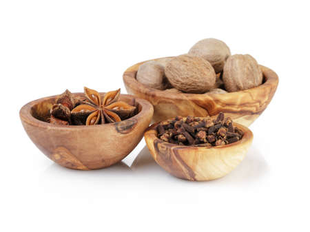 set of spices with nutmeg anise and cloves, isolated on white background