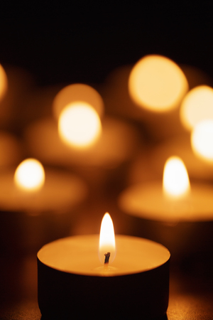 burning candles with beautiful out of focus, shallow DOFの写真素材