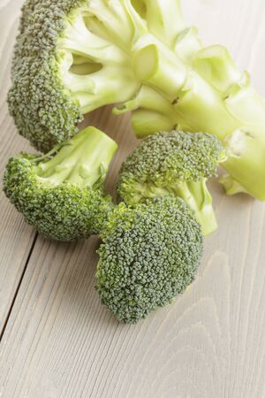 fresh broccoli cabbage on wood tableの写真素材
