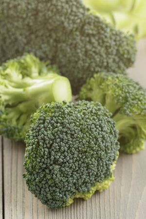 fresh broccoli cabbage on wood tableの写真素材