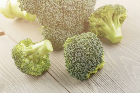 fresh broccoli cabbage on wood tableの写真素材