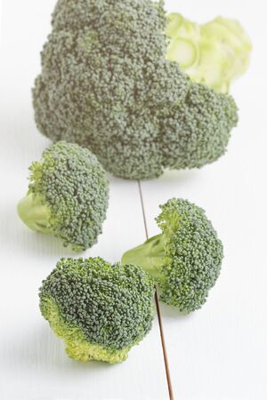 fresh broccoli cabbage on wood tableの写真素材