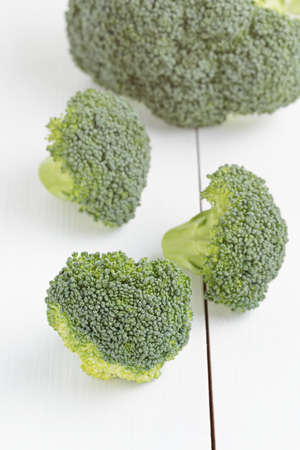 fresh broccoli cabbage on wood tableの写真素材