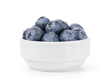 fresh ripe blueberries in white bowlの写真素材