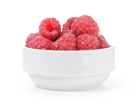 fresh ripe raspberries in white bowlの写真素材