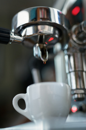 preparing espresso on professional coffee machineの写真素材