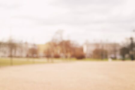 bokeh background in town on square daytime photoの写真素材