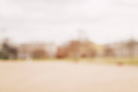 bokeh background in town on square daytime photoの写真素材