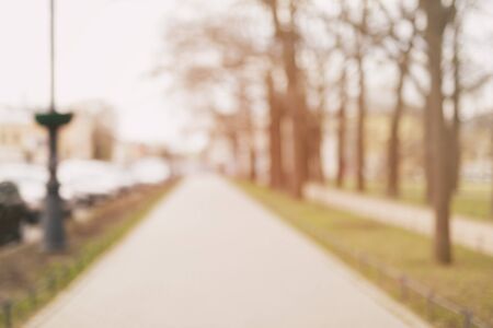 bokeh background in town on alley daytime photoの写真素材