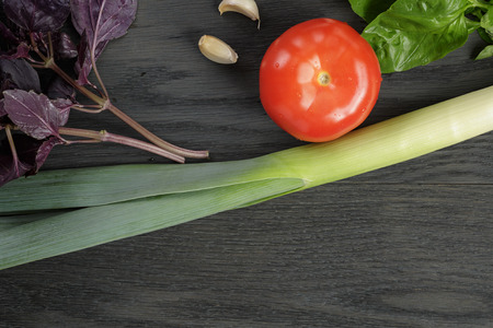 mockup with organic herbs and tomatoの写真素材