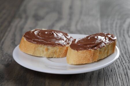baguette with chocolate spread with nutsの写真素材