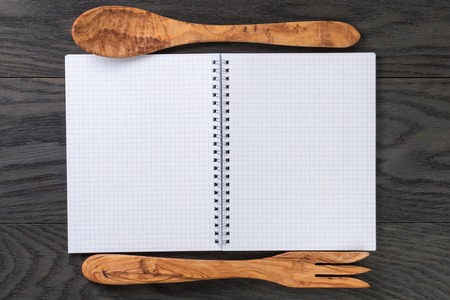 simple blank notepad on rustic wood table, kitchen backgroundの写真素材