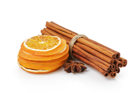 dried oranges with cinnamon and anise, isolated on white backgroundの写真素材