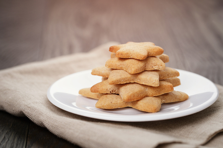 christmas cookies on rustic wood table, homemade foodの写真素材