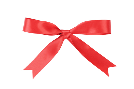 handmade red ribbon bow from above, isolated on white with shadowの写真素材