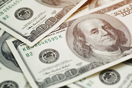 100 dollar bills background, shallow focus close up