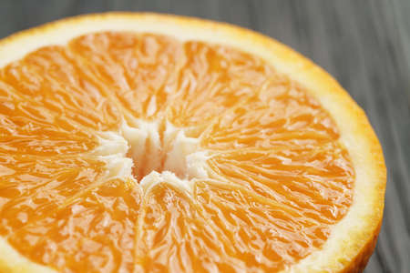 half of ripe orange closeup, shallow focus