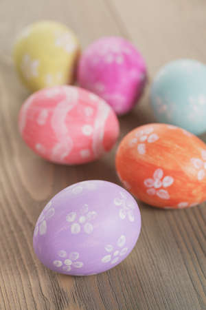 handpainted easter eggs on table, vintage tonedの写真素材