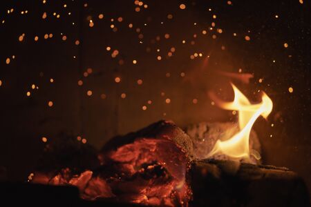 close up of charcoal burning in fireplace, abstract photoの写真素材
