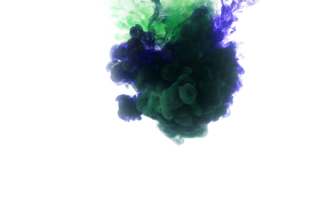 blue watercolor paint in water, shallow focusの写真素材