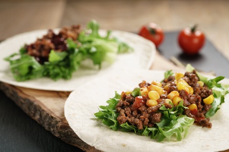 open tortilla with beef, frillice and corn, organic fastfoodの写真素材