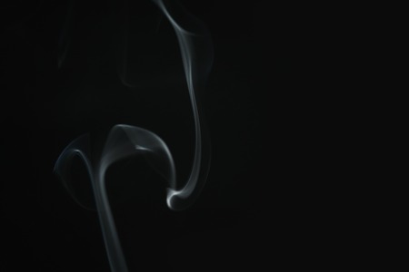 real blue smoke over black background, abstract backdropの写真素材