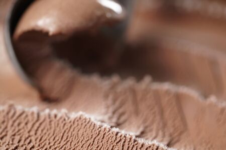 scooping chocolate ice cream close up shot, shallow focusの写真素材