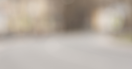 Bokeh blur shot of town street in spring day, wide photoの写真素材