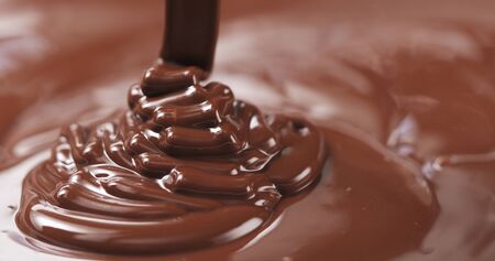 pouring dark melted chocolate