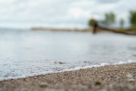 closeup shot of baltic sea shore at autumn morningの写真素材
