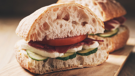 italian sandwich with speck and mozzarellaの写真素材