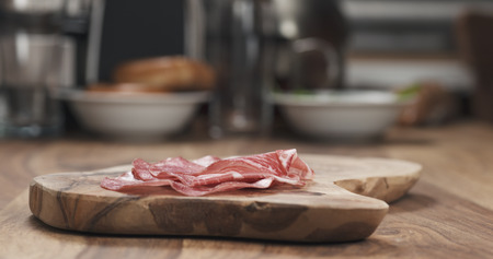 Italian coppa ham on wood board closeupの写真素材