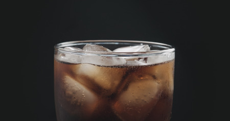 closeup cola in glass with iceの写真素材