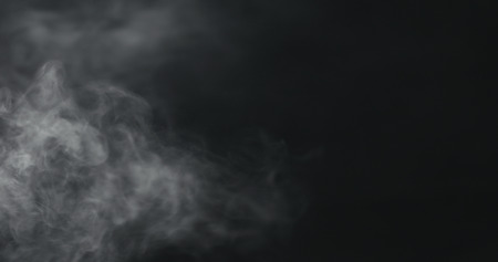 vapor steam from left over black background