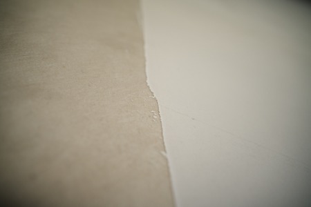 closeup fresh putty applied on the wallの写真素材