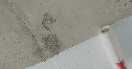 painting concrete ceiling into white with roller