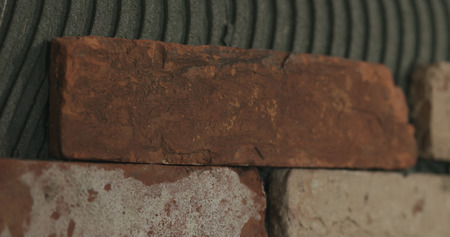 brick cuts tile on the wall closeup