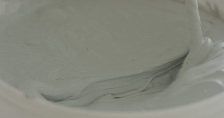 closeup mixing gray decorative concrete plasterの写真素材