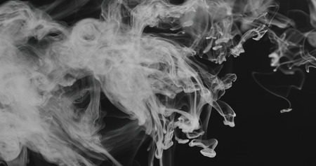 closeup vapor stream from right on black background, wide photo