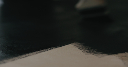 closeup of painted black plywood, wide photoの写真素材